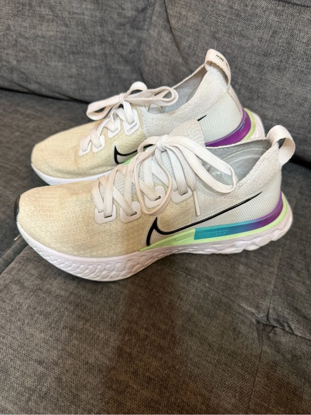Nike Women’s White Running Sneakers with Iridescent Green-Purple Accent